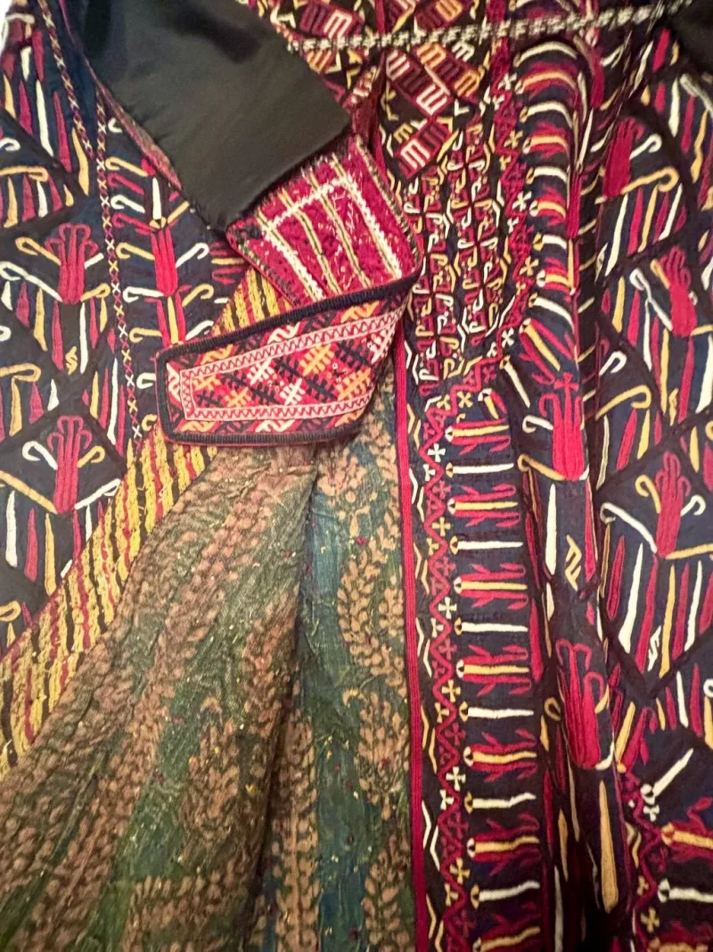 Detail of a Tekke Turkmen bridal robe showing embroidered geometric motifs and tribal ornament